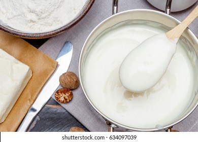 Bechamel Sauce In A Pan And Ingredients