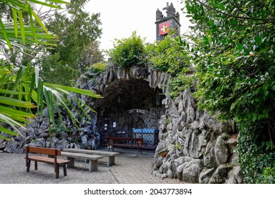 Beckenried, Switzerland - September 01, 2020: A replica of the Grotto which is truly located in Lourdes, France, where Bernadette Soubirous saw a vision of the Virgin Mary in the Massabielle cave.