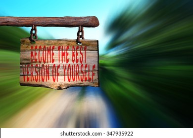 Become The Best Version Of Yourself Motivational Phrase Sign On Old Wood With Blurred Background