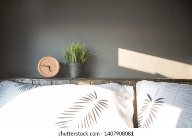 Bed Headboard Idea With Sunlight And Grey Wall Background