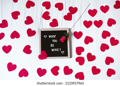 bed at home by letter board Woof you be mine. Red hearts and rose..Valentines concept