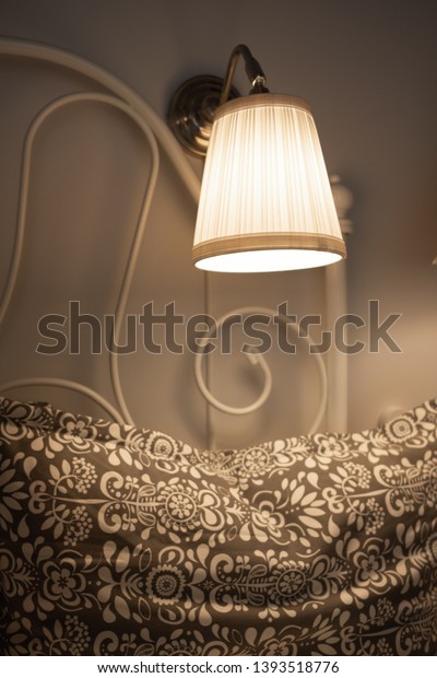 Bed Lamp On Wall Over Bed Stock Photo Edit Now 1393518776