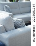 bed with pillows white sofa in a room close up tufted material luxury elegant linen cream designer sofa couch new furniture showroom location furniture store with new sofas and pillows home interior