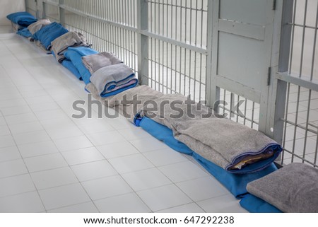 bed of prisoners in prison in asia