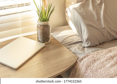 Bed Side Table Top With Laptop And Plant Work From Home Background