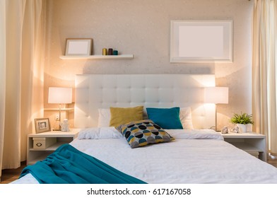 Bed With Soft Headboard And Bedside Tables With Lights