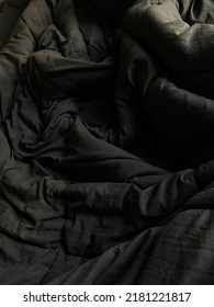 A Bedclothes In A Moody Bedroom