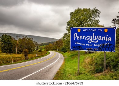 Bedford, PA - October 7, 2021: A Welcome to Pennsylvania state line highway sign on the border shared with Maryland.