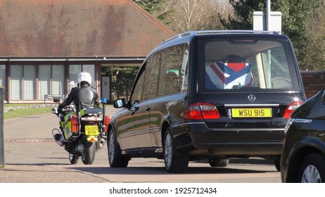 Bedford, UK - February 2 2021: Capt Sir Tom Moore Funeral, Flypast, Gun Salute, Hearse Arrival At Bedford Crematorium 