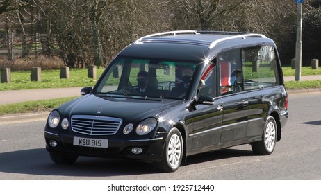 Bedford, UK - February 2 2021: Capt Sir Tom Moore Funeral, Flypast, Gun Salute, Hearse Arrival At Bedford Crematorium 