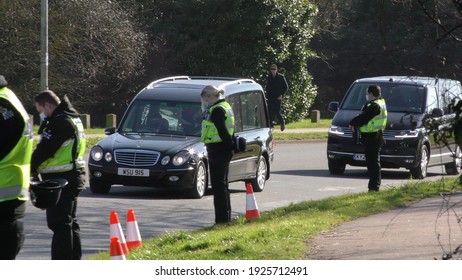 Bedford, UK - February 2 2021: Capt Sir Tom Moore Funeral, Flypast, Gun Salute, Hearse Arrival At Bedford Crematorium 