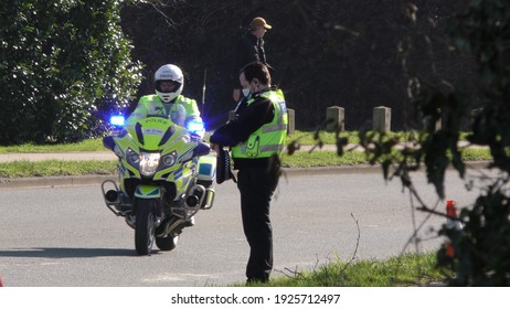 Bedford, UK - February 2 2021: Capt Sir Tom Moore Funeral, Flypast, Gun Salute, Hearse Arrival At Bedford Crematorium 