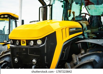Bednary near Poznan, Poland - September 20, 2019: Logo of british brand JCB on tractor heavy machine. Jcb manufacturing equipment for construction, agriculture and demolition. Agroshow in Poland.