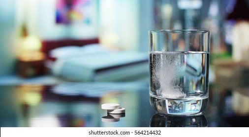 In A Bedroom Before Going To Sleep, An Effervescent Tablet Is Made To Dissolve In A Glass Of Water. Concept: Vitamin, Medicine, Care Of Your Body.