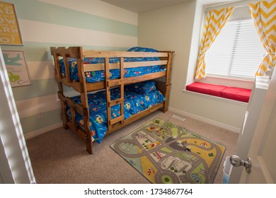 A Children’s Bedroom With A Bunkbed