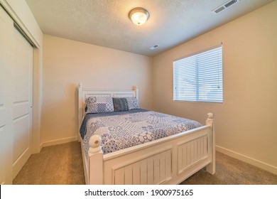 Bedroom interior with double bed window and flush mount dome ceiling light