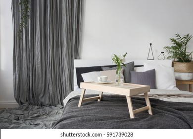 Bedroom Interior With Small Table On Bed