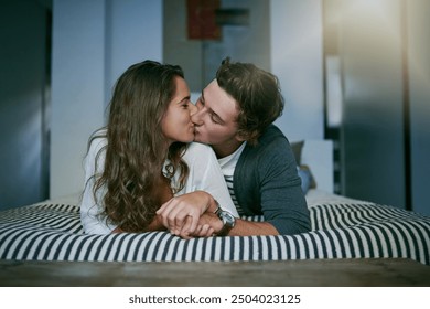 Bedroom, kissing and couple with love, relax and morning with kindness, trust and bonding together. Home, embrace and man with woman, dating and care with romance, hug and marriage with relationship