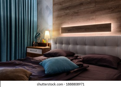 Bedroom At Night With Luxury Bed And Dressing Table