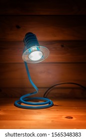 Bedside Lamp In Mountain Cottage Bedroom At Night, No People