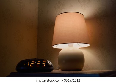 Bedside Table With Lamp And Clock