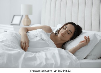 Bedtime. Beautiful woman sleeping in bed at home - Powered by Shutterstock