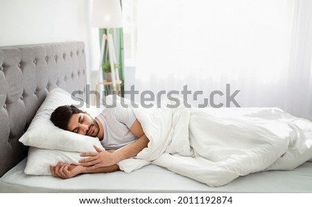Similar – Image, Stock Photo Man sleeping on bed with dog. Pet affection