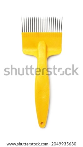 Bee hive uncapping comb on white background