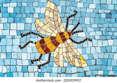 Bee made up of ceramic tiles
Nice flying bee over blue colored tiles
 - Shutterstock ID 2201929937