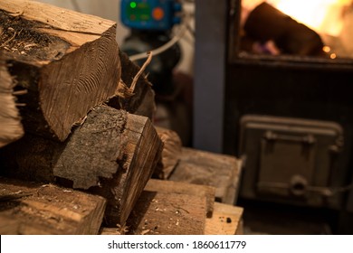 Beech Firewood In Focus, Opened Door On Home Central Heating Furnace With Burning Fire.