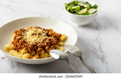 Beef Bolognese With Gnocchi And A Pear Salad