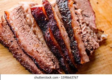 
Beef Brisket barbecue. Chopped Beef Brisket. Traditional Texas Smoke House meat. Rubbed with spices and smoked in a Texas smoke house over mesquite wood in traditional classic bbq method.  - Shutterstock ID 1598663767