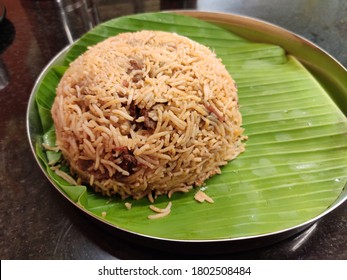 Beef Briyani In Bannana Leaf And Steel Plate 