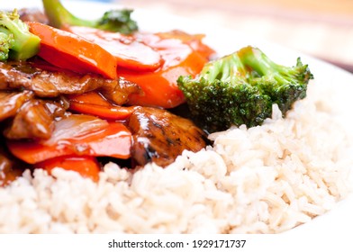 Beef With Broccoli And Carrot Stir Fry Over Brown Rice