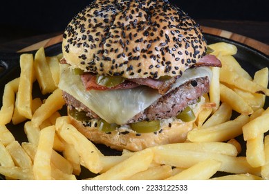 beef burger sandwich with french fries salad and cheese - Shutterstock ID 2233122533