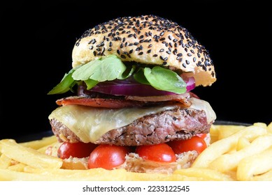 beef burger sandwich with french fries salad and cheese - Shutterstock ID 2233122545