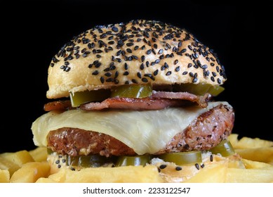beef burger sandwich with french fries salad and cheese - Shutterstock ID 2233122547