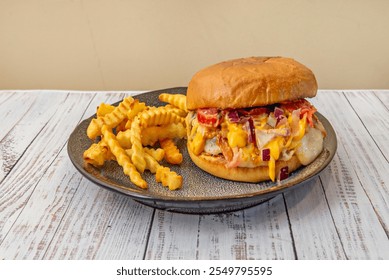 Beef burgers with fries are a classic dish, especially popular in American cuisine - Powered by Shutterstock