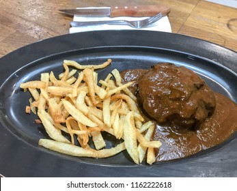 Beef Cheek With Sauce And French Fries
