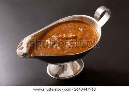 Beef curry in a curry pot