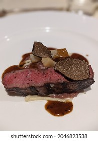 Beef Flank Filet Steak With Truffles And Mushrooms. Top View. Fancy Dinner