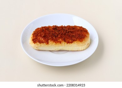 Beef floss bun served on plate isolated on creamy background - Shutterstock ID 2208314923
