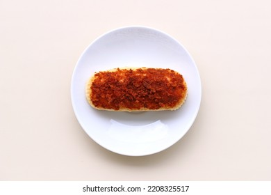 Beef floss bun served on plate isolated on creamy background - Shutterstock ID 2208325517