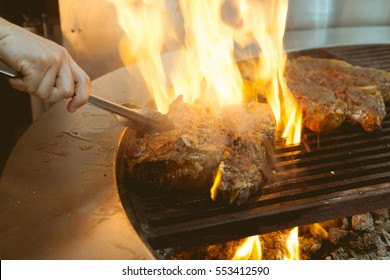 Beef Grill On Stove In Five Star Hotel Restaurant For Luxury Dinner Party, Blurry Background Vintage Color Style.