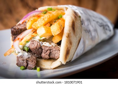 Beef Gyros Greek Style Wrap In Pita Bread With French Fries