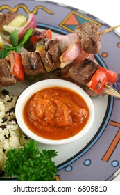 Beef Kebabs And Currant Couscous With Harissa Sauce.