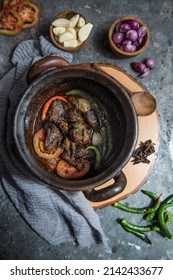 Beef Meat Cooked In Clay Pot Tomato Chili Spice Shallot Top View Wooden Display