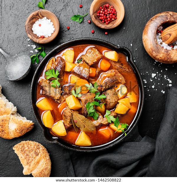 Beef meat  stewed with potatoes, carrots and\
spices (hungarian\
goulash).
