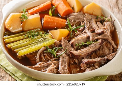 Beef Meat And Vegetables Stew Homemade Slow Cooker Pot Roast With Carrots, Celery And Potatoes Close Up In The Bowl On The Wooden Table. Horizontal
