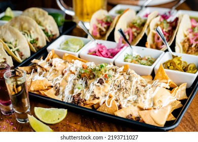 Beef Nachos And Street Tacos With Condiments.